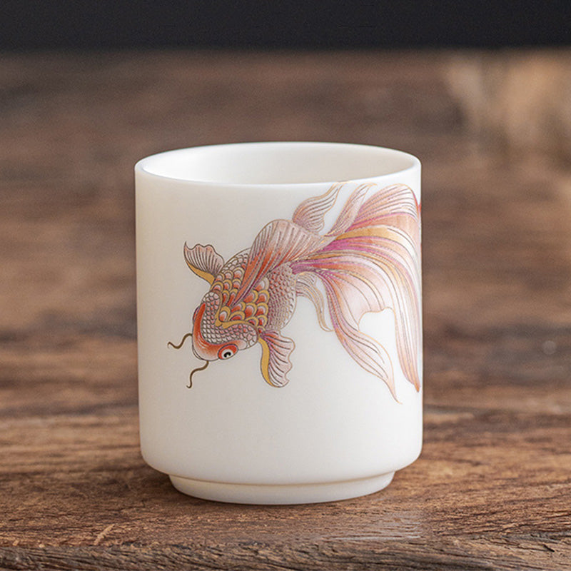 Koi Fish White Porcelain Cup - wide angle with tea pot and cups, complete tea set scene