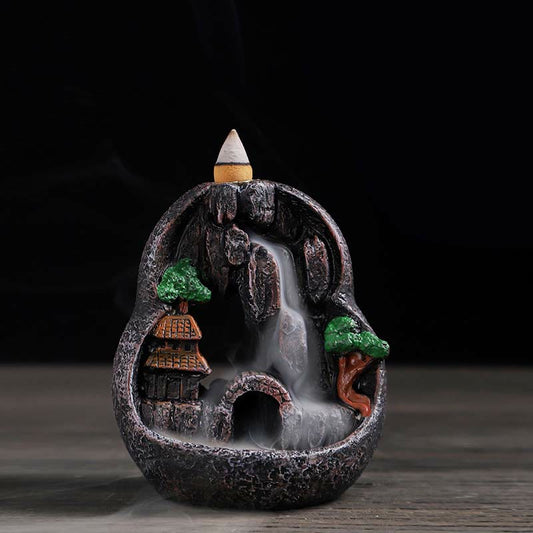 Resin Backflow Incense Burner – Oval stone-style burner with pagoda, trees and cascading smoke waterfall, zen decor