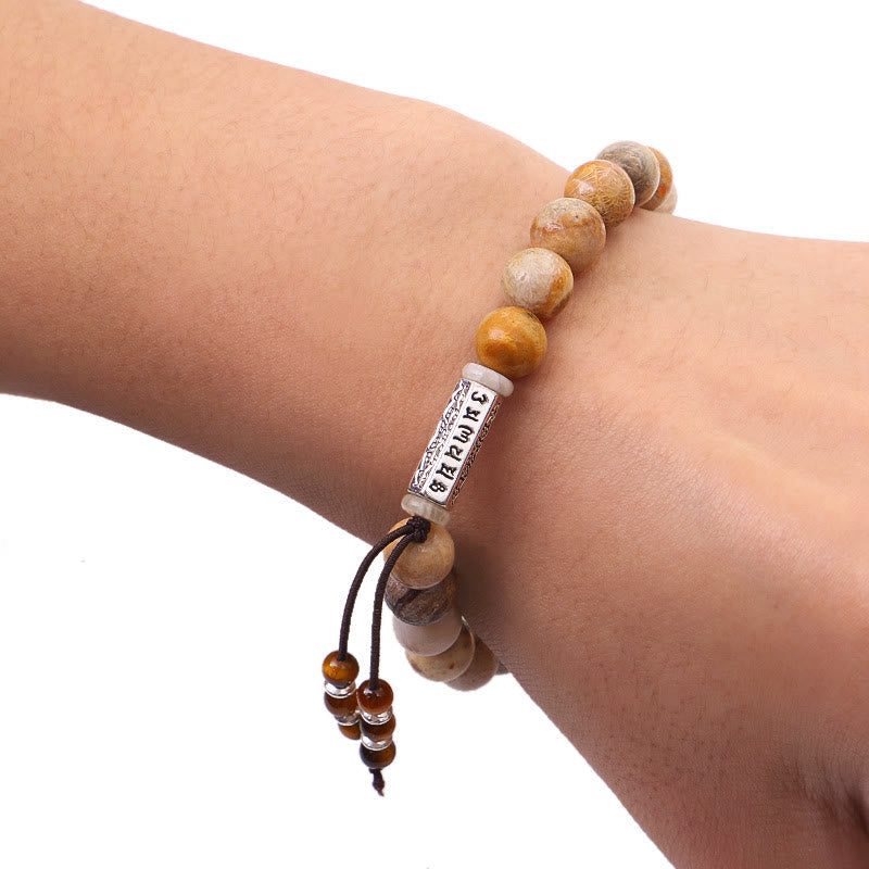 Weathered Stone Om Mani Padme Hum Bracelet – natural stone bracelet with mantra charm worn on wrist, spiritual bead jewelry