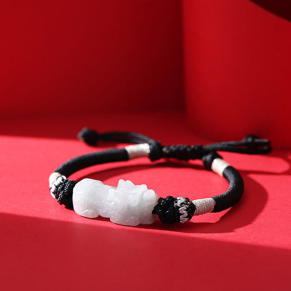 Natural Jade PiXiu Bracelet – front close-up red background, white jade carving detail, jade prosperity