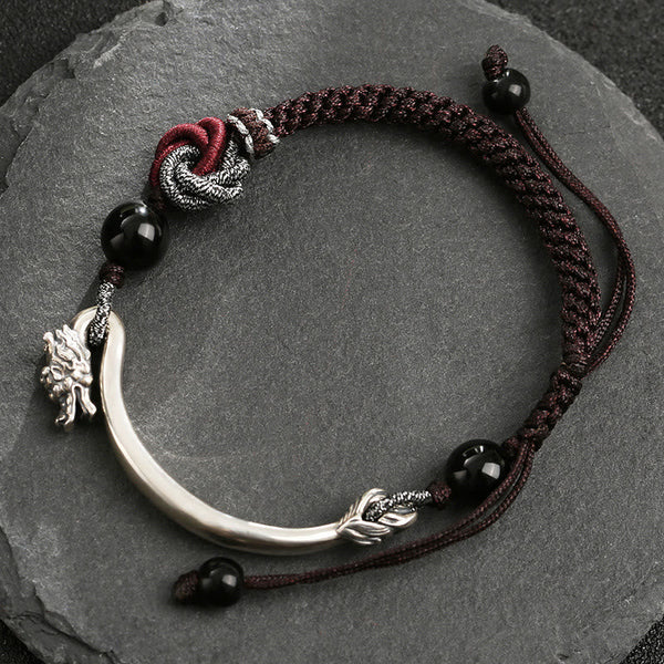 Dragon Braided Bracelet – red brocade runner with lotus motifs and scroll borders, auspicious home accent