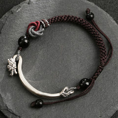 Dragon Braided Bracelet – red brocade runner with lotus motifs and scroll borders, auspicious home accent