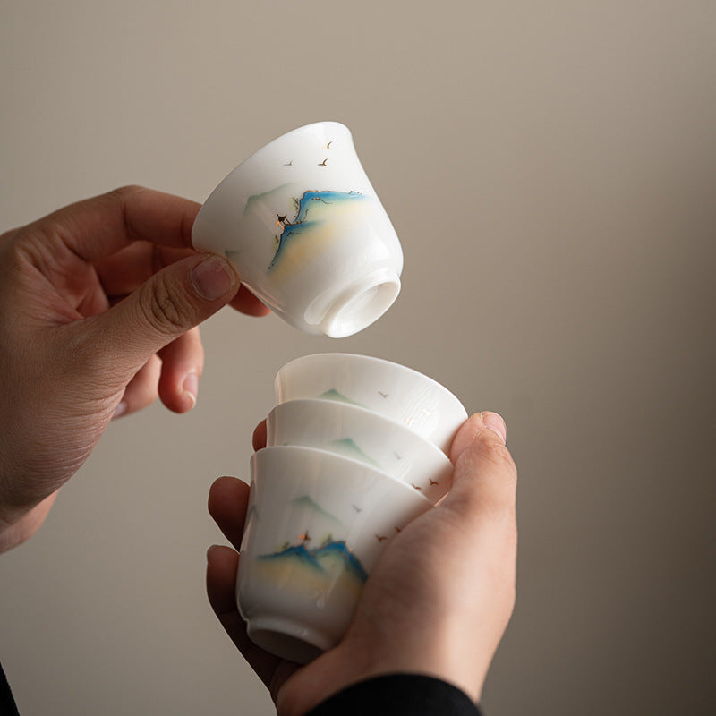 Ceramic Kung Fu Tea Cup – four stacked cups showing continuous mountain panorama, tea ceremony preparation, elegant