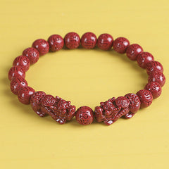 Double PiXiu Cinnabar Bracelet – Front view of red carved mantra beads with dual PiXiu figures, spiritual bracelet