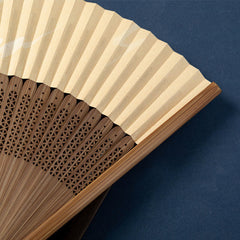 Lotus Dragonfly Wild Geese Silk Bamboo Folding Fan - close-up geometric openwork carving on brown bamboo ribs, artisanal