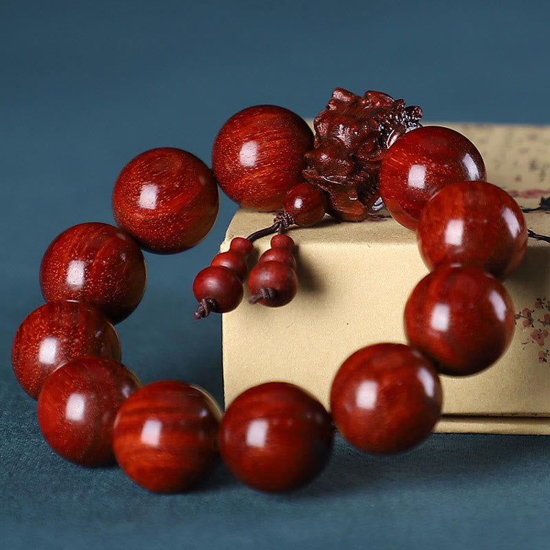 Multi-Wood Dragon Bracelet - Red sandalwood beads with foo dog centerpiece on floral box, Protection