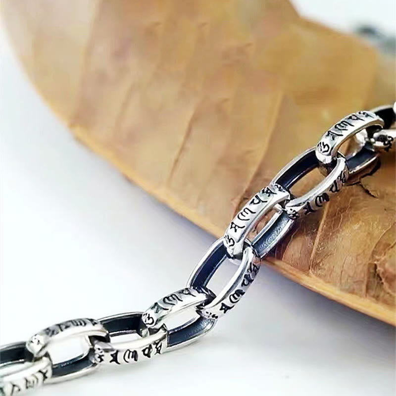 Double Dorje Wisdom Bracelet - Curved chain on natural bark prop, engraved mantra links, artisan jewelry