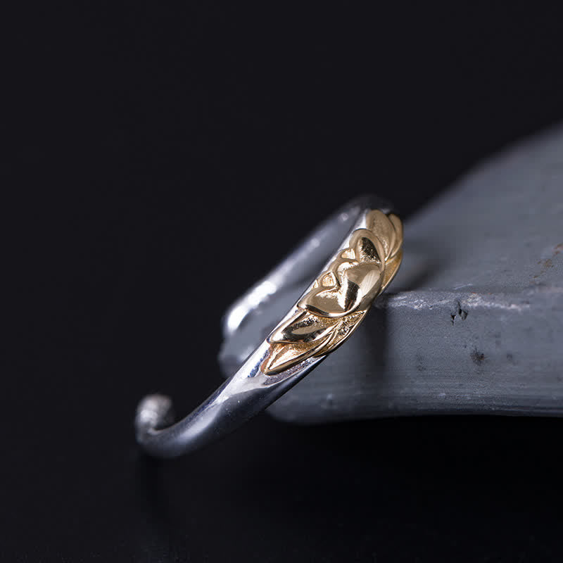 925 Sterling Silver Lotus Ring – Raised gold lotus on silver band resting on crystal rock, adjustable ring