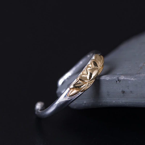925 Sterling Silver Lotus Ring – Raised gold lotus on silver band resting on crystal rock, adjustable ring