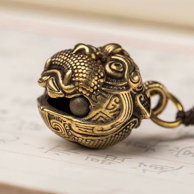 Pixiu Wealth Copper Key Chain – side close-up showing inner bell, brass pixiu sphere traditional craftsmanship detail