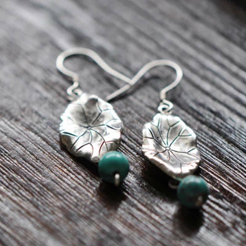 Sterling Silver Turquoise Lotus Leaf Earring - on rustic wood grain, handcrafted charm
