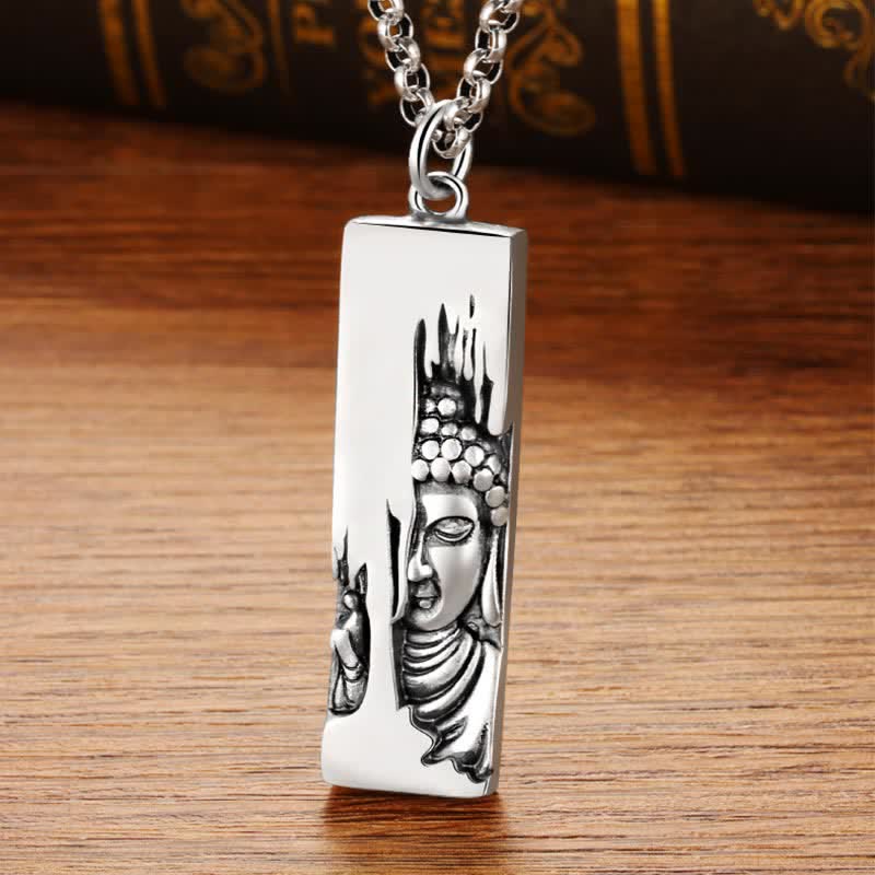 Tathagata Buddha Copper Amulet Necklace – half-face Buddha pendant on wood surface with silver rolo chain, studio light, zen