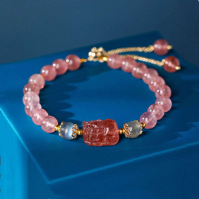 Strawberry Quartz PiXiu Bracelet – pink beads gray accents blue display, love stone