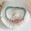 Hetian Jade Pearl Fu Gourd Money Bag Bracelet – Strawberry quartz PiXiu bracelet on white seashell, romantic feng shui