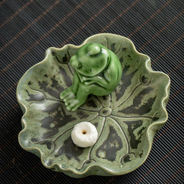 Ceramic Frog Incense Burner – On wooden tray with hand, Smoke wisps, Mindful