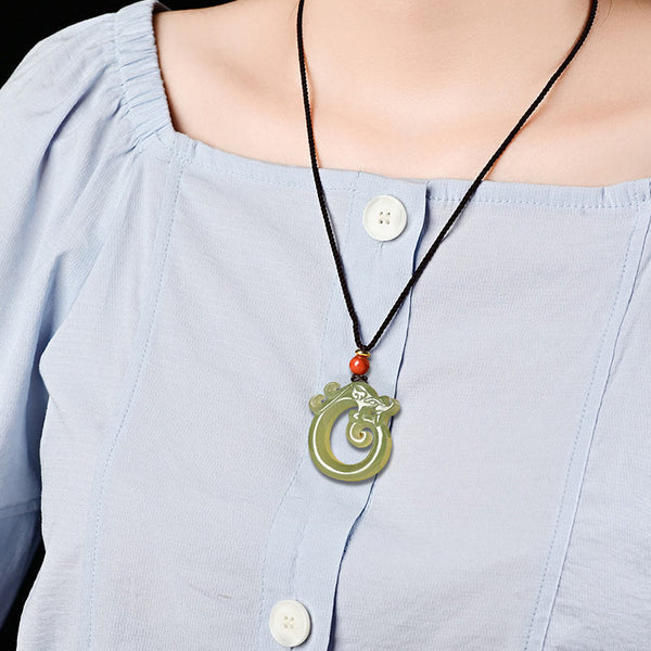 White Jade Cyan Jade Dragon Pendant – green jade dragon necklace worn on model, elegant