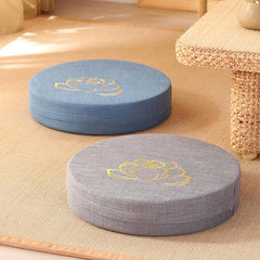 Lotus Meditation Cushion - Blue and gray zafu with gold embroidery on woven mat, floor seating