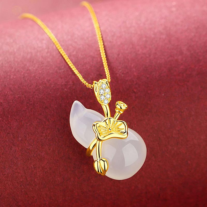 Cyan Jade Gourd Pendant Necklace - white jade calabash with gold botanical metalwork and stone accents, studio shot
