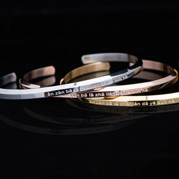 Om Mani Padme Hum Engraved Bracelet – four metal color cuffs stacked together, engraved bangle set