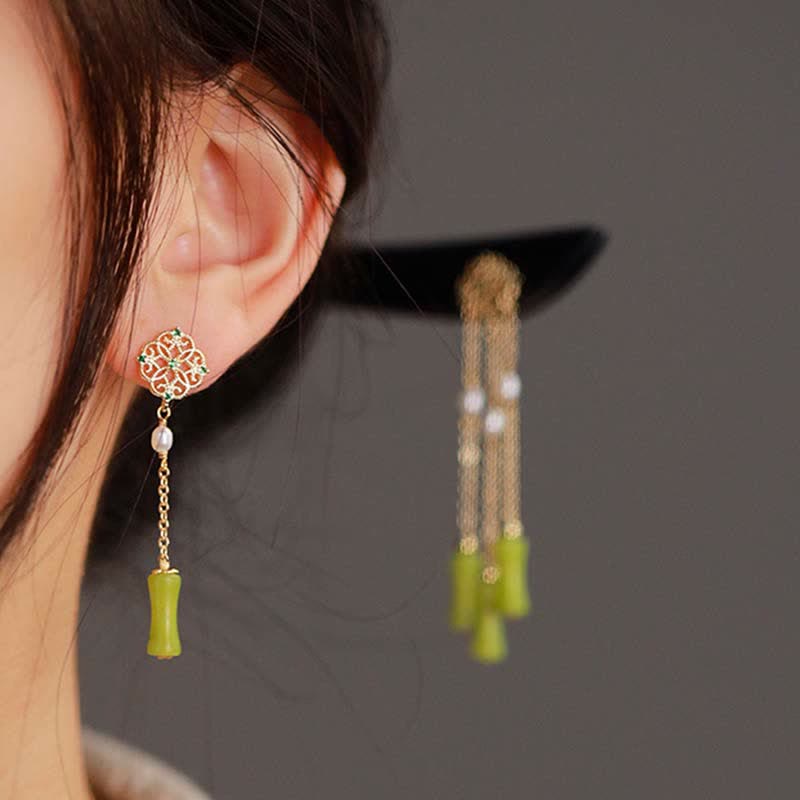 Peridot Ebony Wood Hairpin, styled with matching peridot earrings, side profile