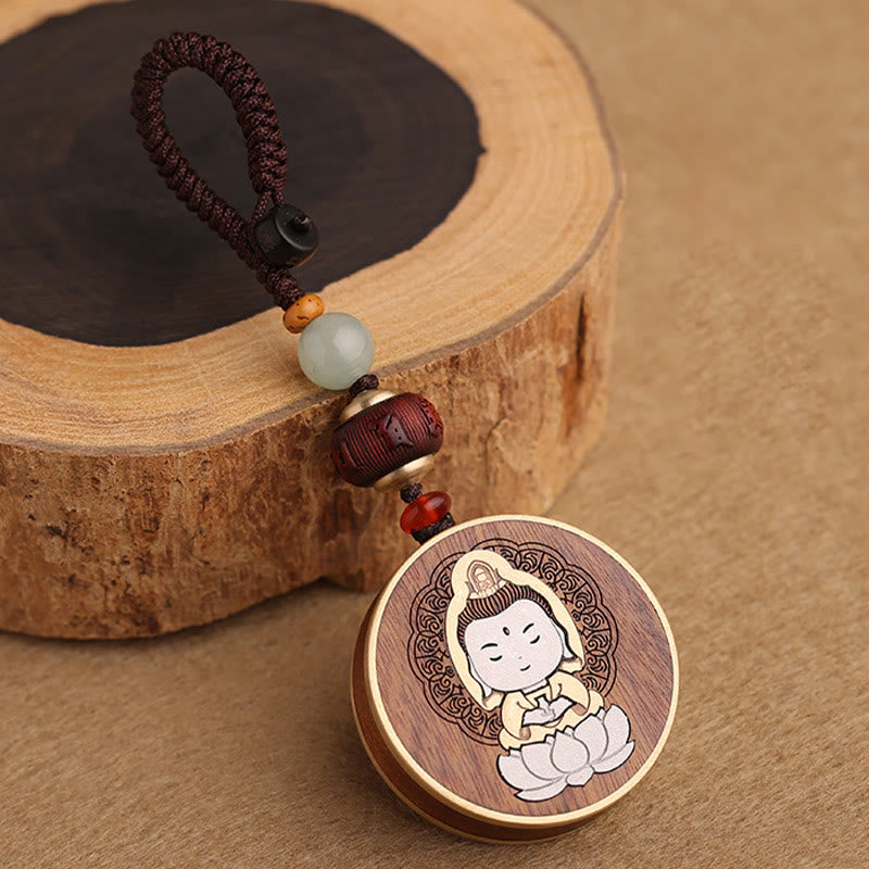 Ebony Avalokitesvara Keychain – size measurement with centimeter scale, compact amulet dimension guide