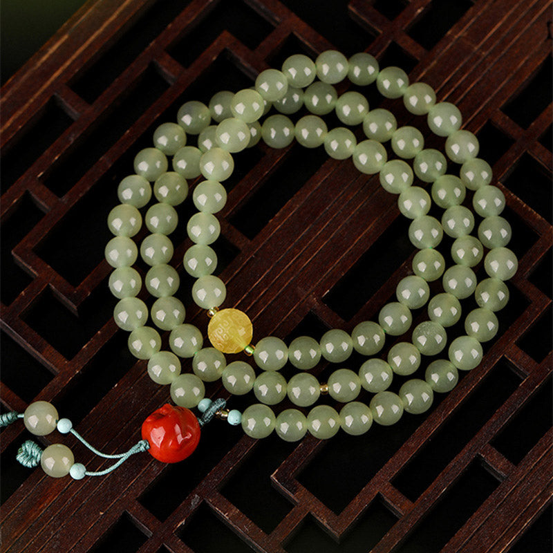 Red Agate Buddha Bracelet - Styled with elegant outfit, daily wear spiritual accessory
