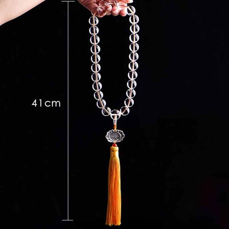 White Crystal Lotus Mala – frosted white beads with golden tassel and lotus charm on white background, prayer bracelet