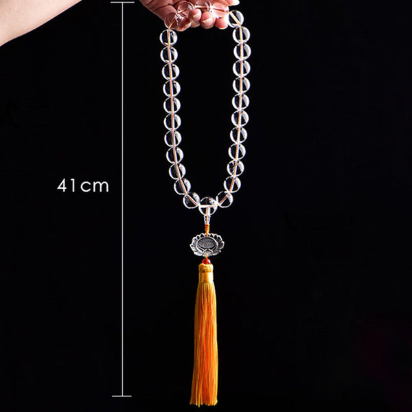 White Crystal Lotus Mala – frosted white beads with golden tassel and lotus charm on white background, prayer bracelet