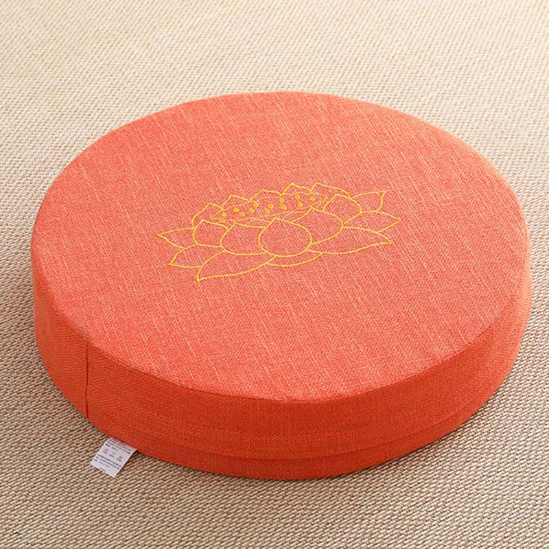 Coral Lotus Zafu - Gold embroidered lotus on orange linen meditation cushion, warm tones