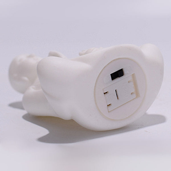 Ceramic LED Bodhisattva Decoration – statue base, battery switch, white background, detail, function