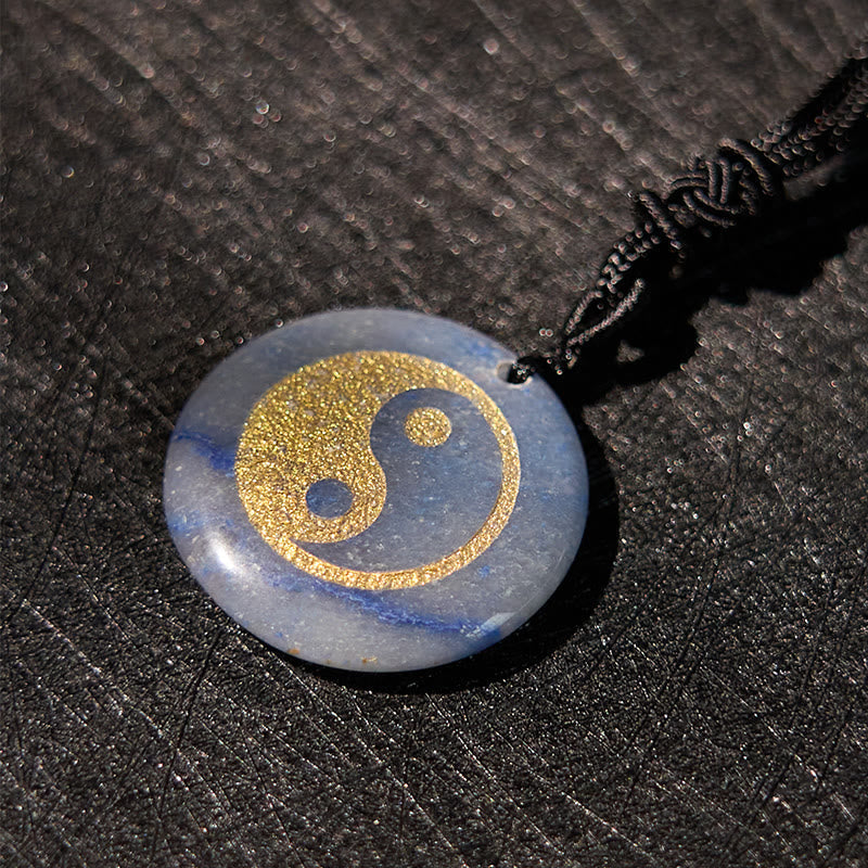 Yin Yang Crystal Necklace – Oval blue sodalite pendant with natural gray veining and cobalt blue striations, polished glossy 