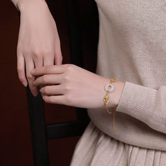 White Jade Koi Bracelet – angled view revealing translucent quality and smooth polish of each bead