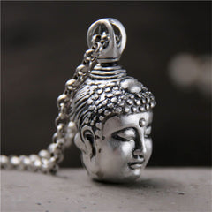 999 Silver Buddha Ghau Pendant Necklace – Front view of meditating Buddha figurine, peace mindfulness decor