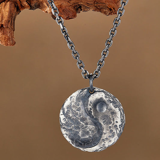 Sterling Silver Yin Yang Necklace – Antiqued silver medallion on cable chain, natural wood branch prop