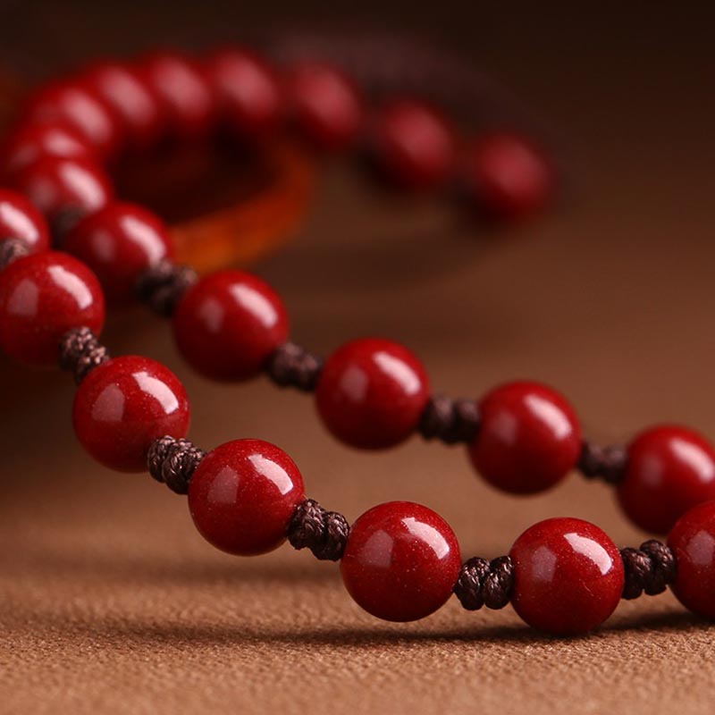 Cinnabar Hetian Jade Dragon Necklace - hand-knotted red cinnabar bead strand, glossy polished finish