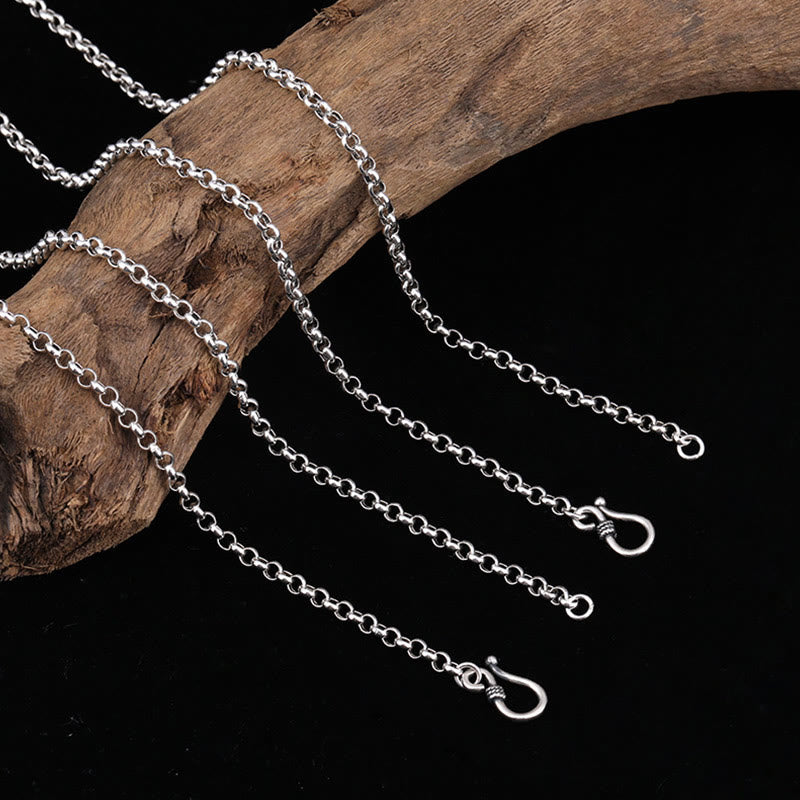 925 Sterling Silver Green Tara Necklace - Sterling silver chain with hook clasp on wood, necklace detail