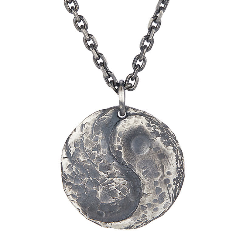 Sterling Silver Yin Yang Necklace – Hammered yin-yang pendant front view on white background, oxidized finish