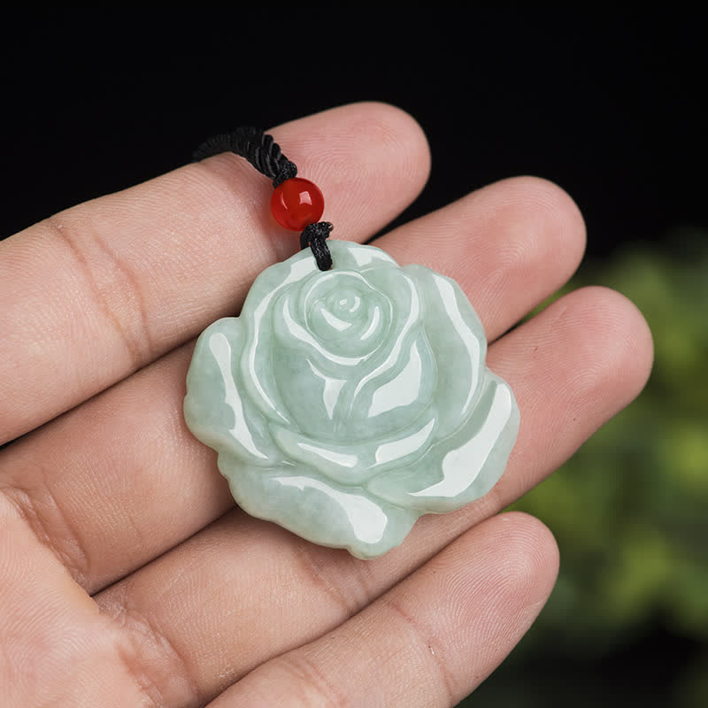 Lotus Pattern Jade Prosperity Necklace - hand-held jade rose showing scale, carved jade