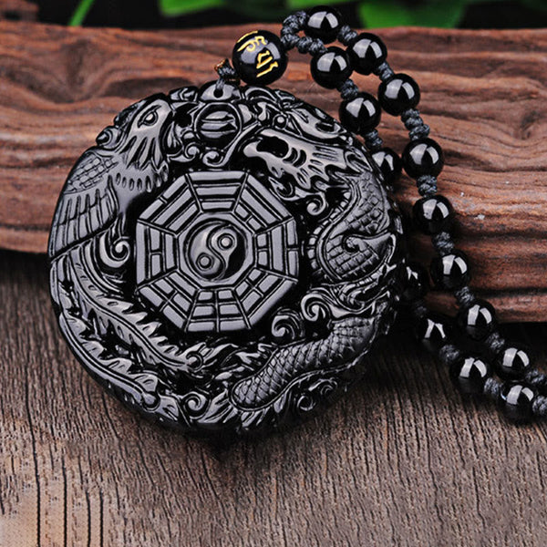 Bagua Dragon Phoenix Obsidian Pendant – Relief carving on weathered wood slab, feng shui