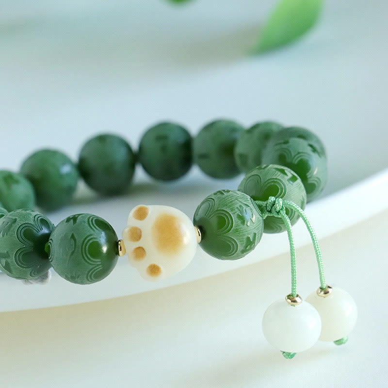 Bodhi Seed Om Mani Padme Hum Carved Bracelet - Black onyx white jade yin-yang bracelet, engraved metal center bead, gold C...
