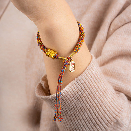 Multicolored Tibetan Om Mani Padme Hum Ruyi Braided Bracelet – Worn on wrist with knit sleeve, lucky charm