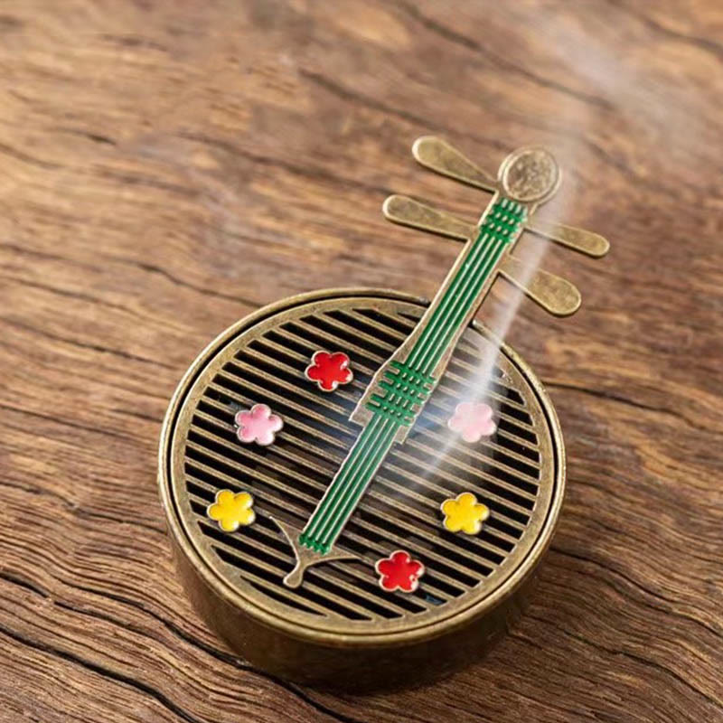 Copper Incense Burner Set – pipa-shaped burner with blue neck and enamel flowers, smoke on wood