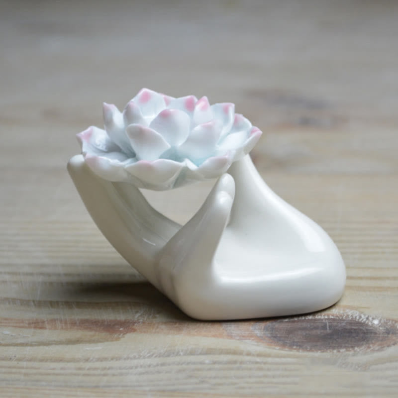 Ceramic Lotus Hand Incense Burner - mudra hand holding layered lotus bloom, spiritual calm
