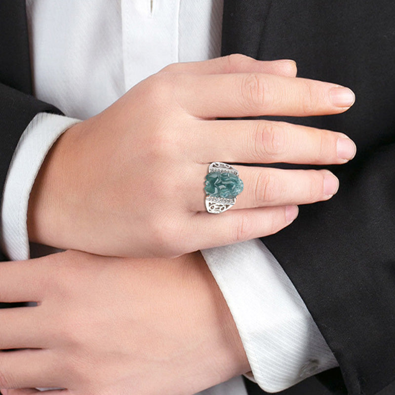 925 Sterling Silver Jade PiXiu Luck Ring – Jade PiXiu ring on man's hand in black suit, formal style