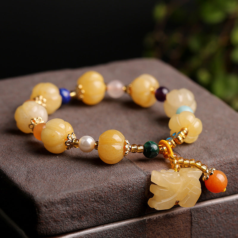 Golden Silk Jade Bracelet – yellow jade beads Pixiu gray stone slab, elegant wealth accessory