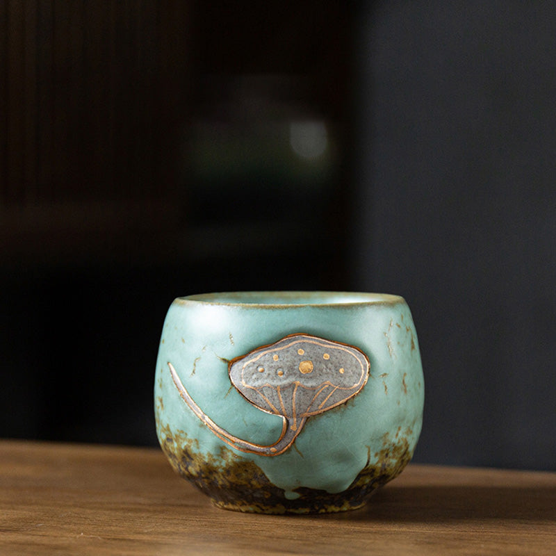 Lotus Pod Ceramic Kung Fu Tea Cup - Celadon glaze with gold-seeded lotus pod relief, premium craft