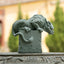 Feng Shui Dragon Sandstone Statue dragon on stone base, warm outdoor bokeh, three-quarter view, watchful