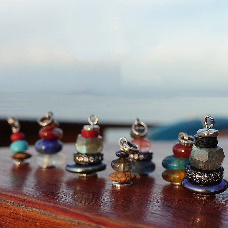 Zen Cairn Crystal Pendant – seven colorful stacked charms with crystal inlays on wood, lifestyle jewelry