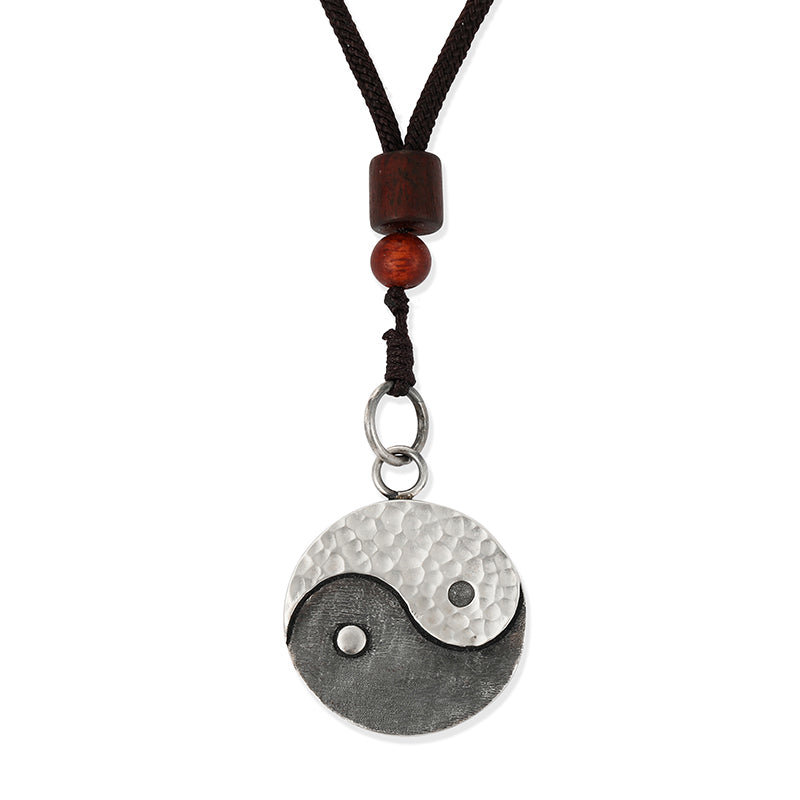 Sterling Silver Yin Yang Pendant - Silver teardrop pendant worn with textured shirt and hat, bohemian men necklace