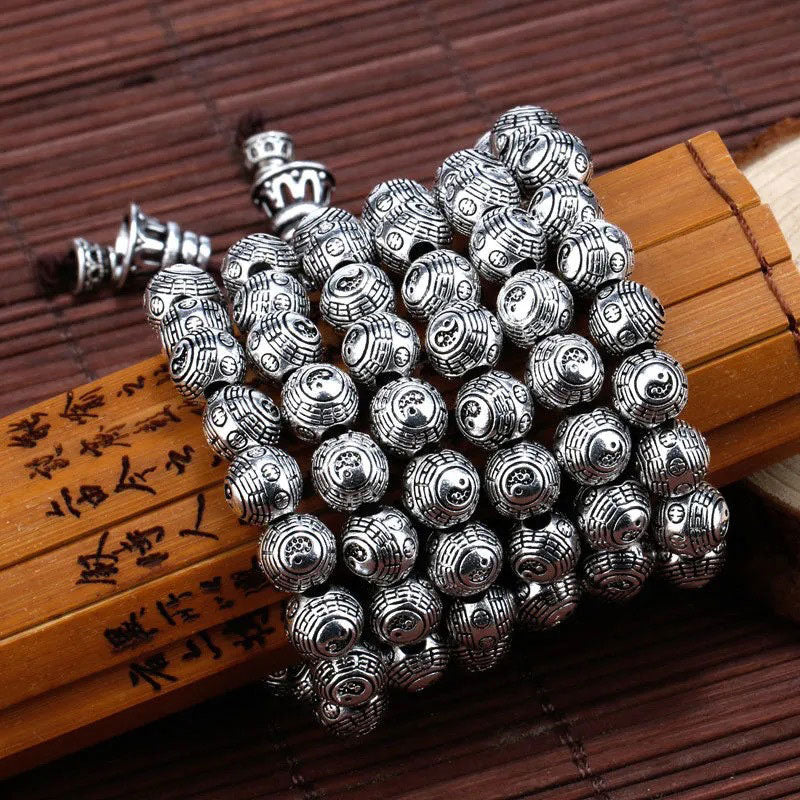 Tibetan Feng Shui PiXiu Silver Bracelet – Mala-style bracelet with 108 miniature Bagua beads and Buddhist tower guru bead on bamboo scroll and woven mat